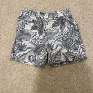Janie and Jack Boy’s Black and White Tropical Print Swim Trunks in Size 8
